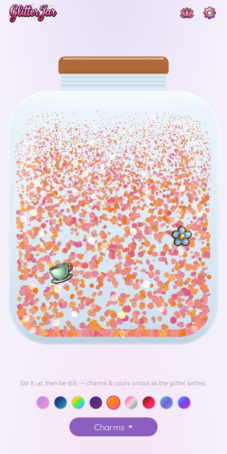 Glitter Jar in its daylight theme — coral and peach glitter settling through a pale jar on a blush background